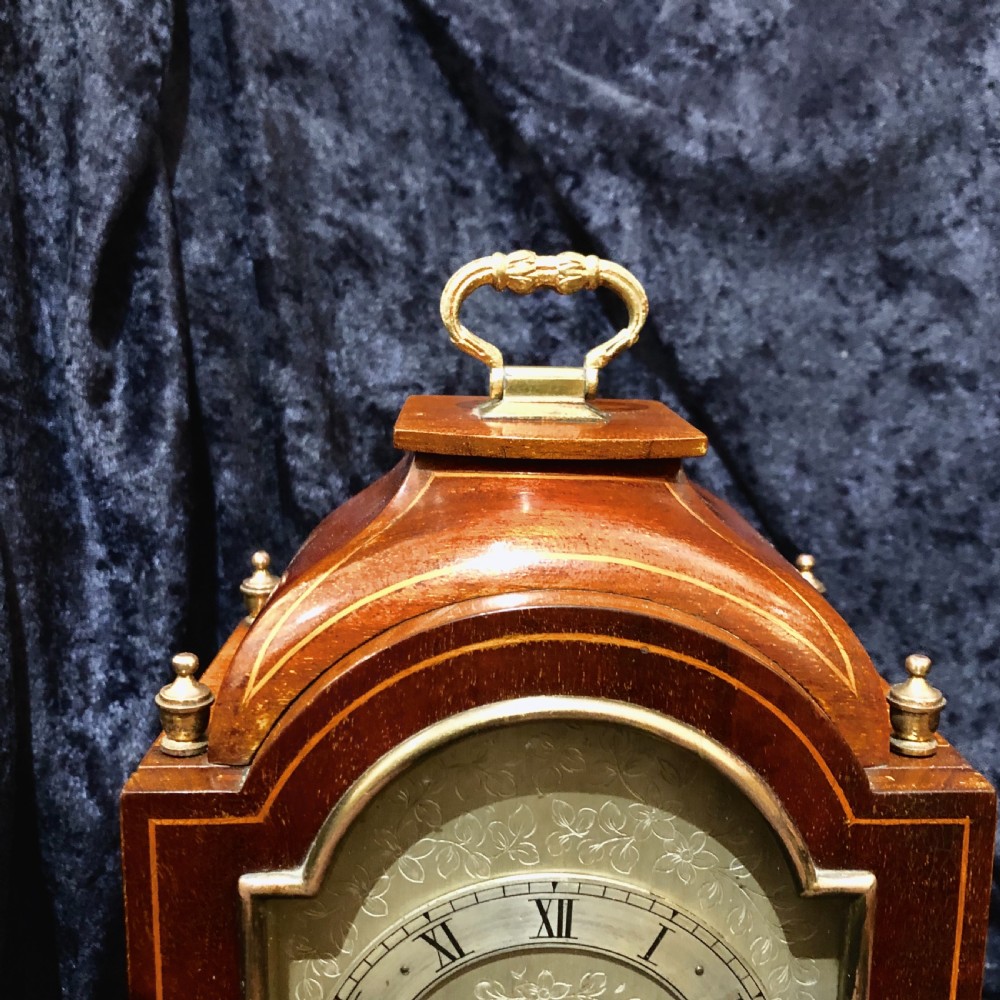 A small Edwardian mahogany mantel clock  View IV