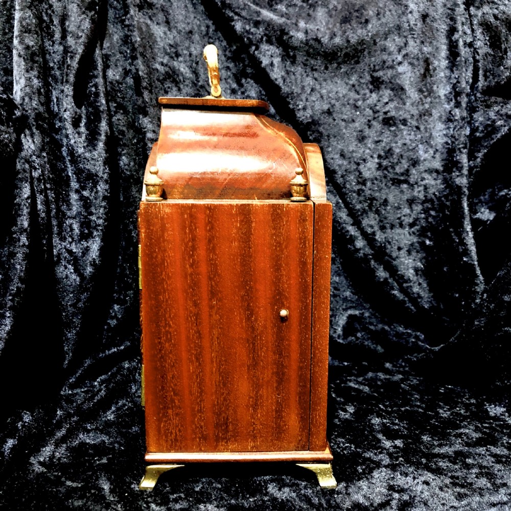 A small Edwardian mahogany mantel clock  View V