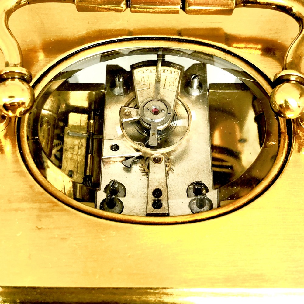 A late 19th century French gilt brass carriage clock  View V