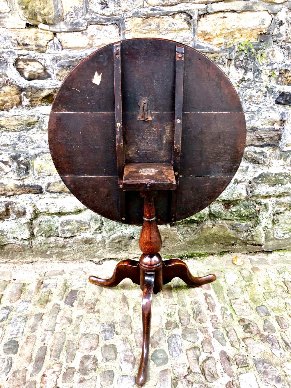 An early George III oak tripod table  View V