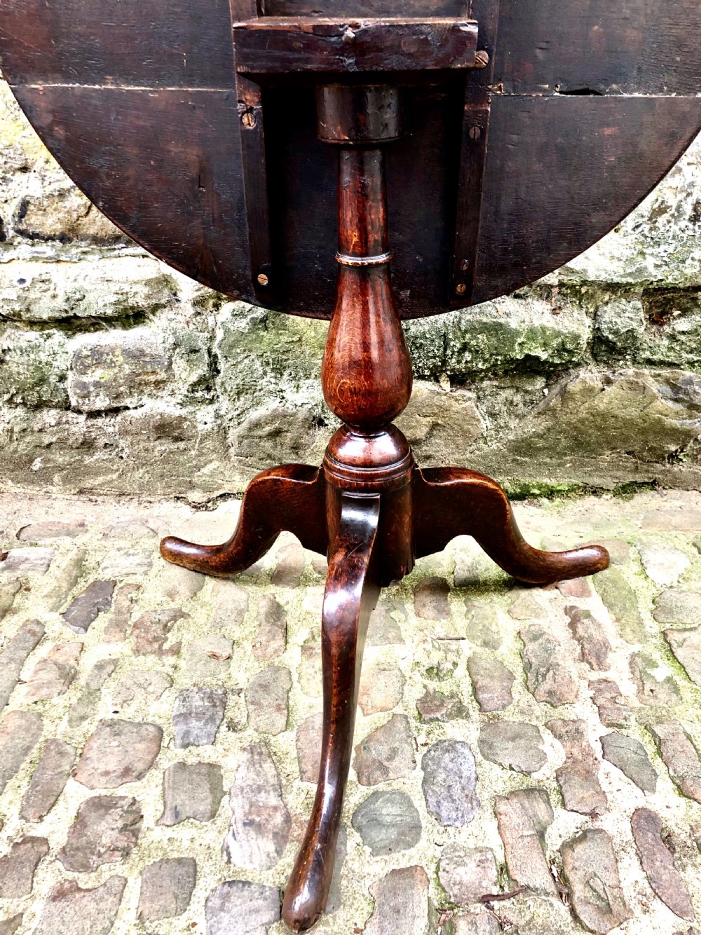 An early George III oak tripod table  View VII