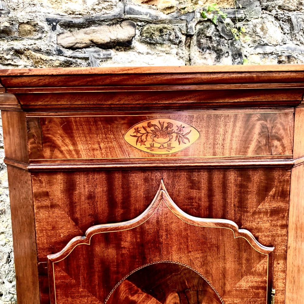 A small 19th century mahogany corner cupboard  View II