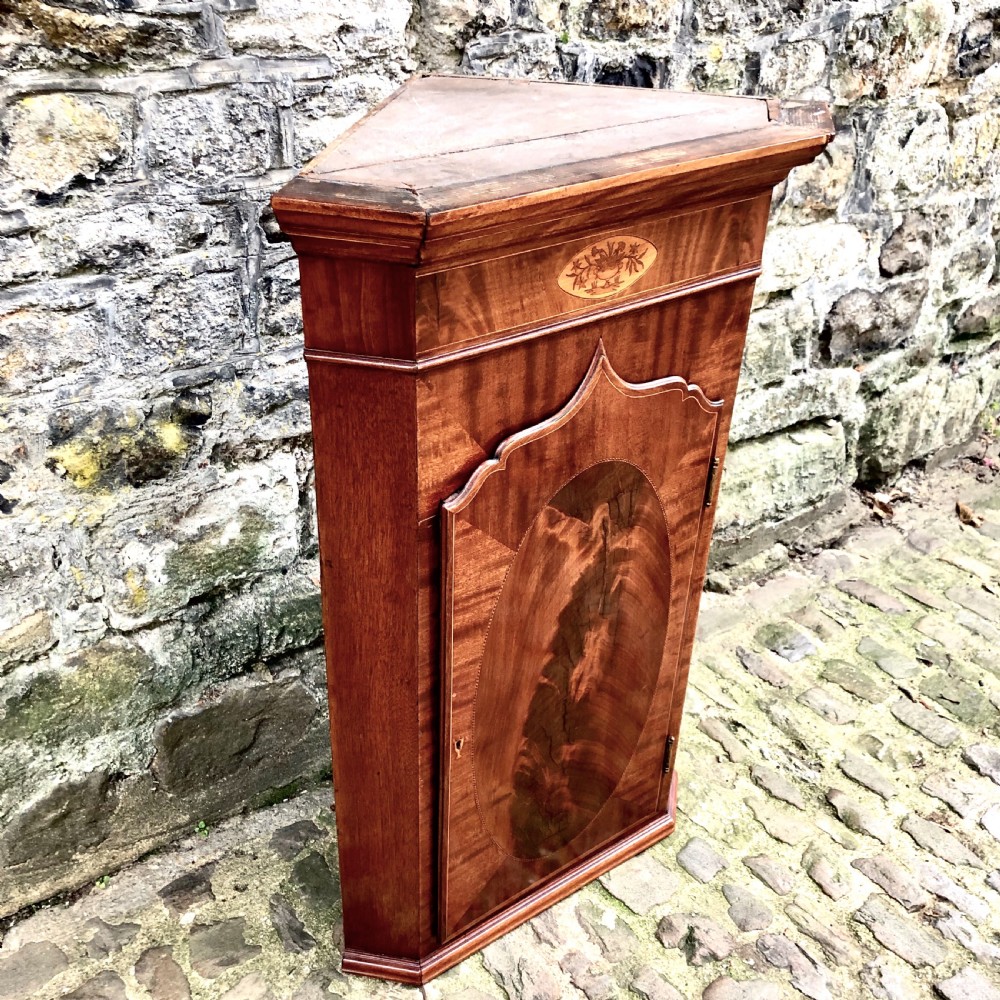 A small 19th century mahogany corner cupboard  View III