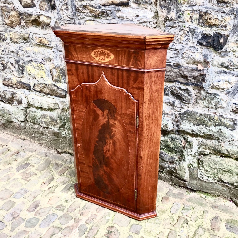 A small 19th century mahogany corner cupboard  View V