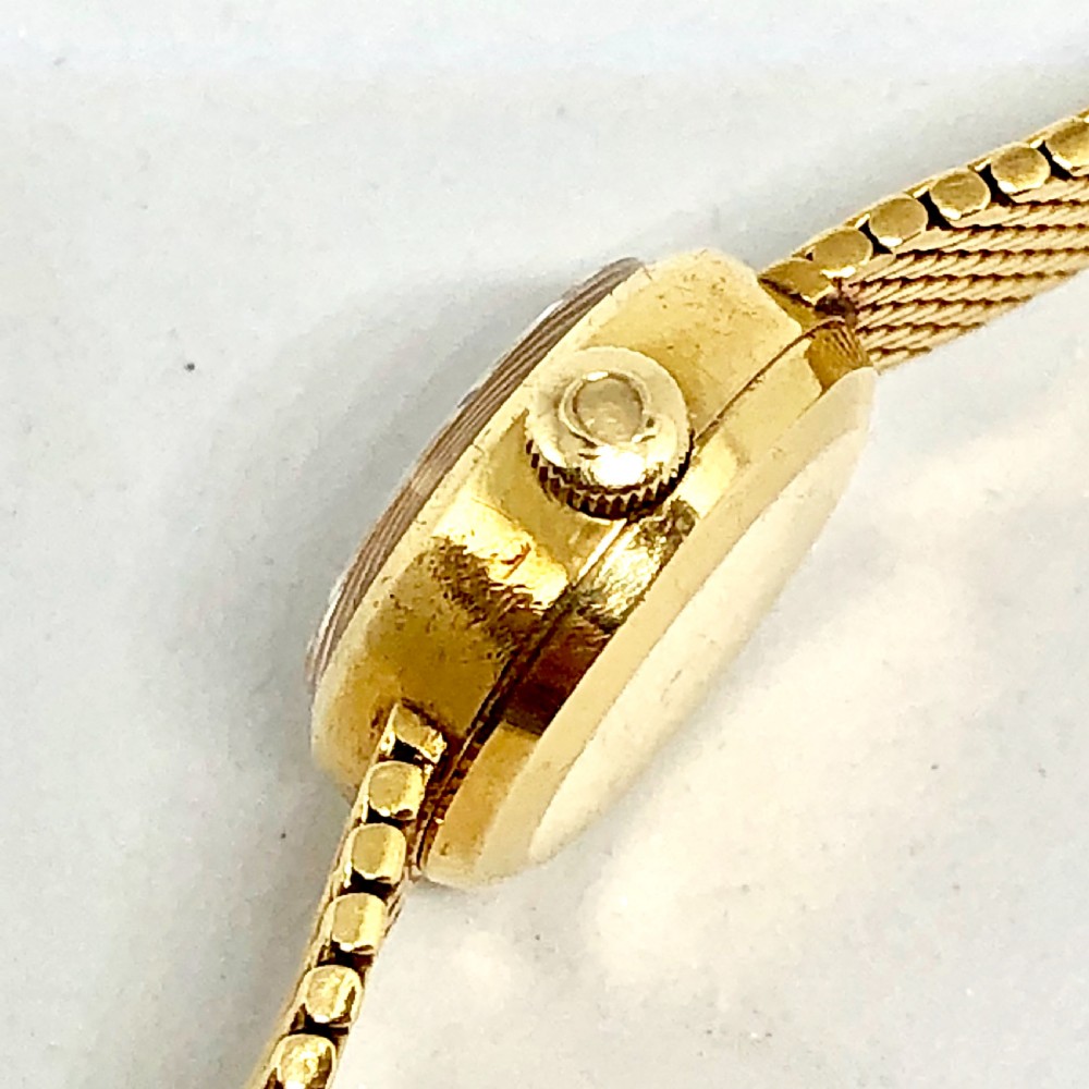 An 18 carat gold Omega ladies wristwatch circa 1957 View V