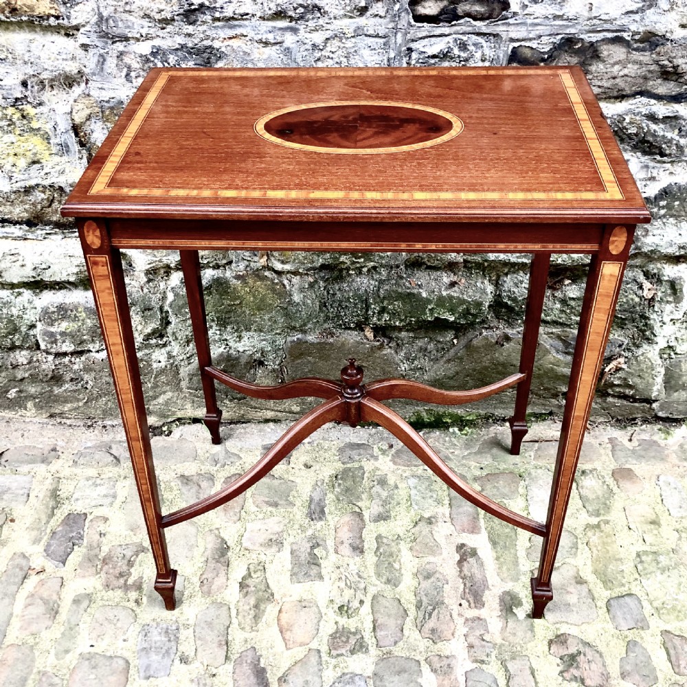 A small Edwardian mahogany side table 