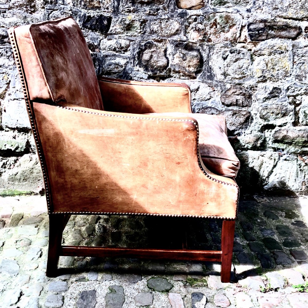 An Edwardian leather and mahogany armchair  View III