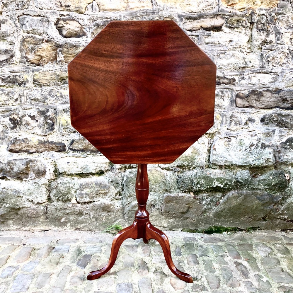 A George III mahogany tilt-top wine table 