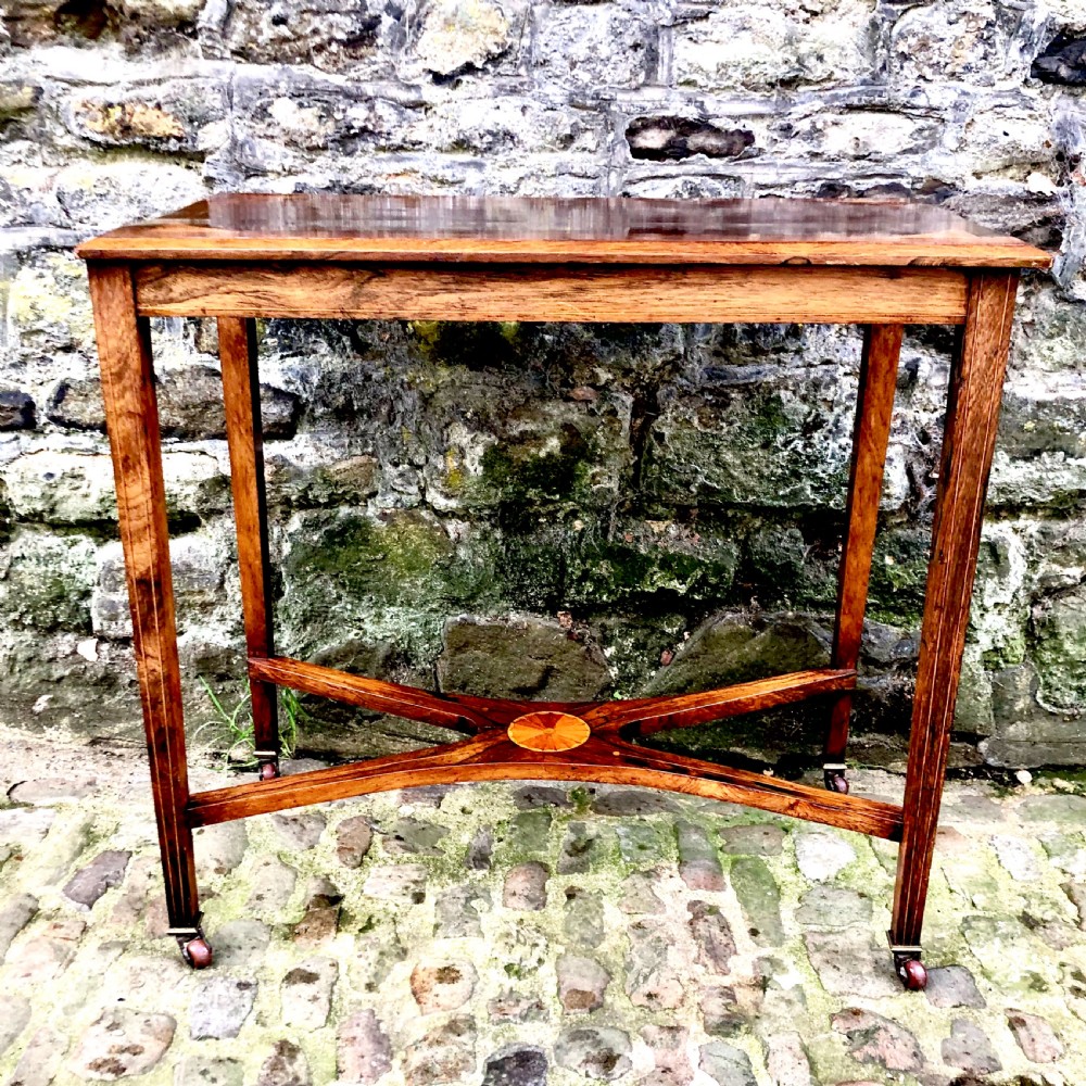 An Edwardian rosewood console table 