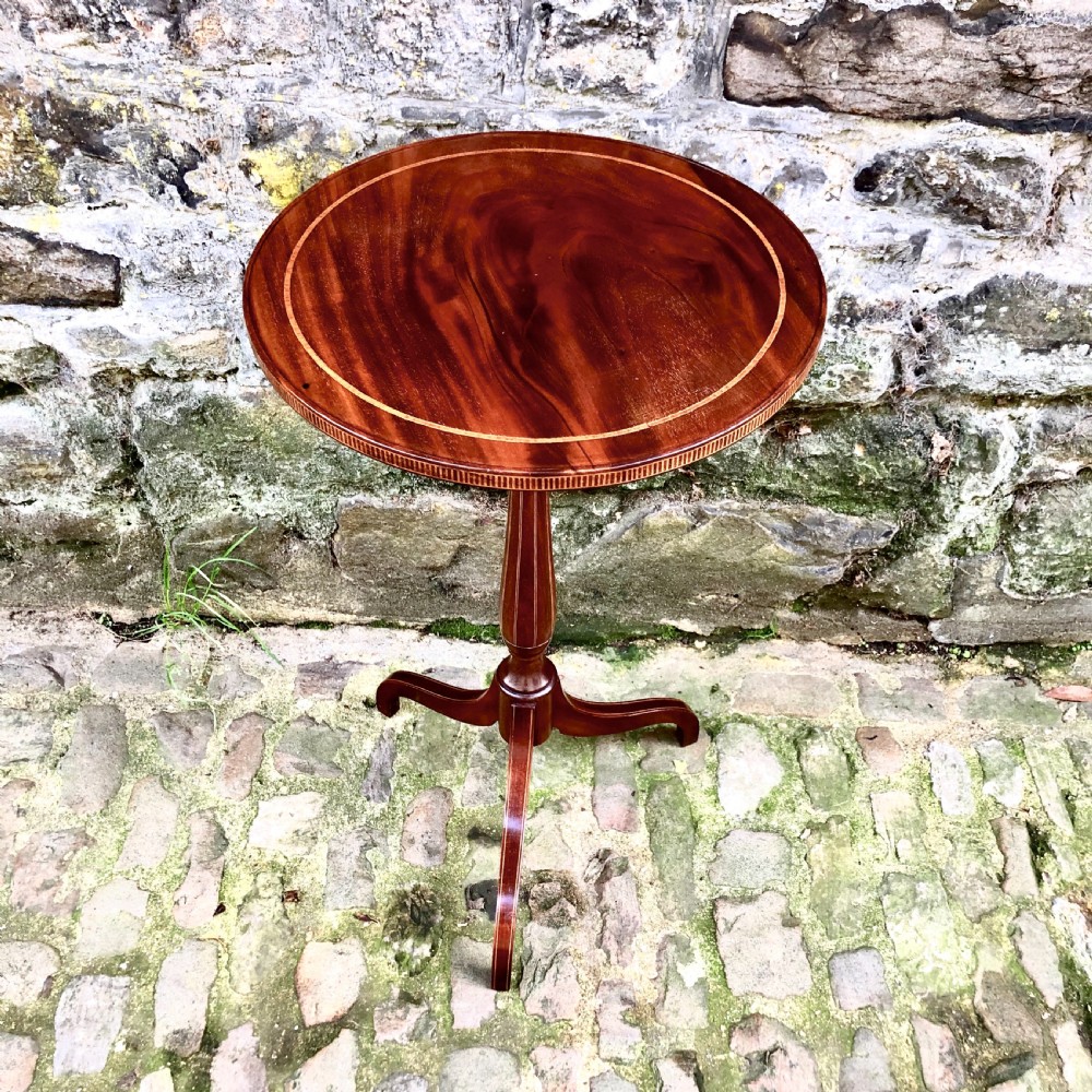 A late 19th century mahogany wine table 