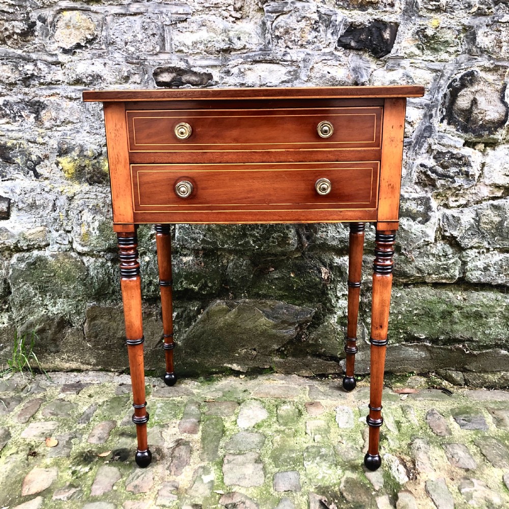 A Regency mahogany side table  View II