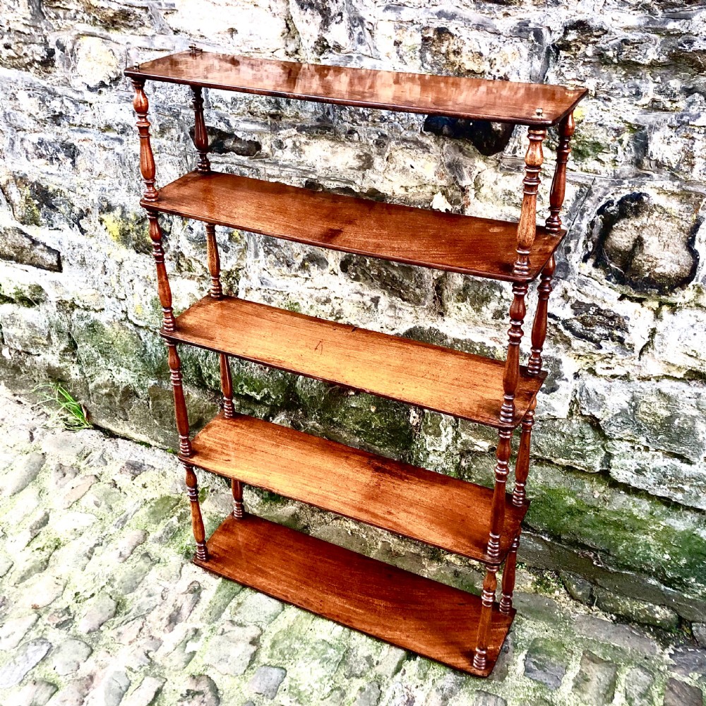 A George IV set of mahogany hanging shelves  View II