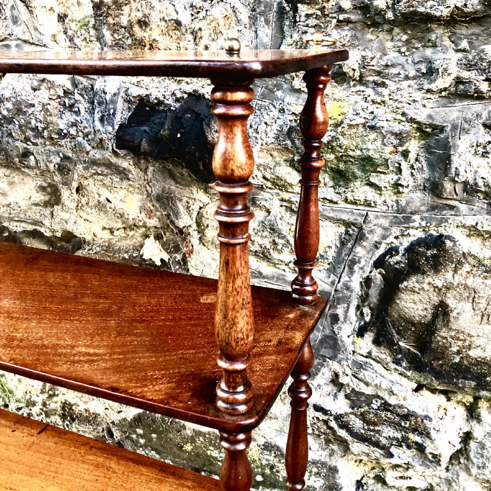 A George IV set of mahogany hanging shelves  View VI