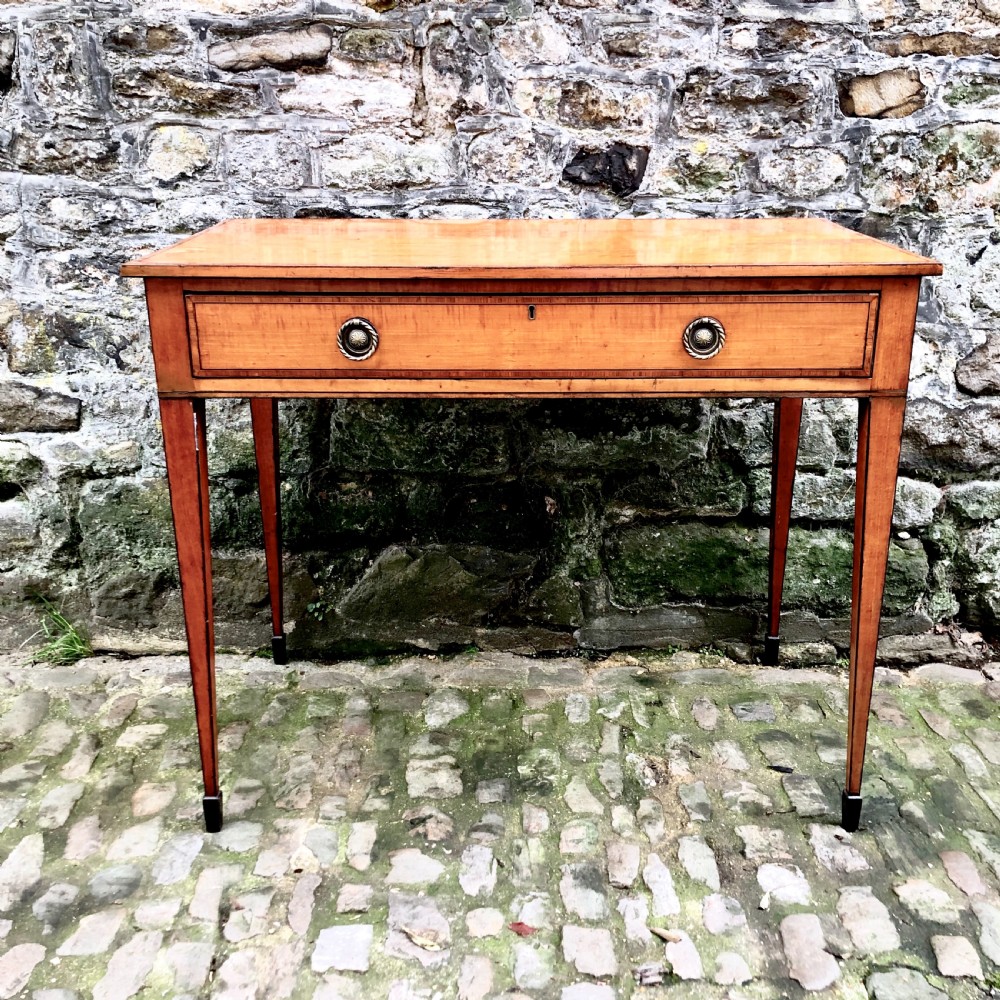 A George III Sheraton satinwood side table 