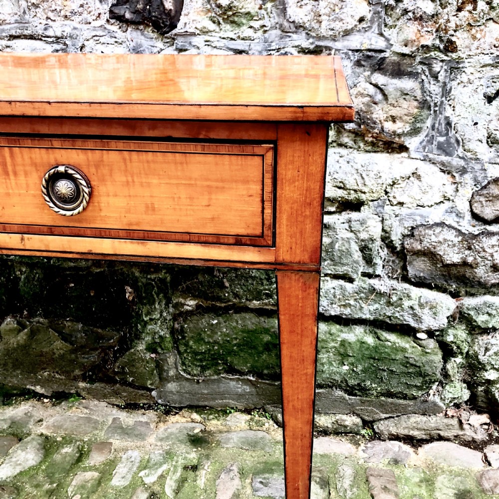 A George III Sheraton satinwood side table  View III