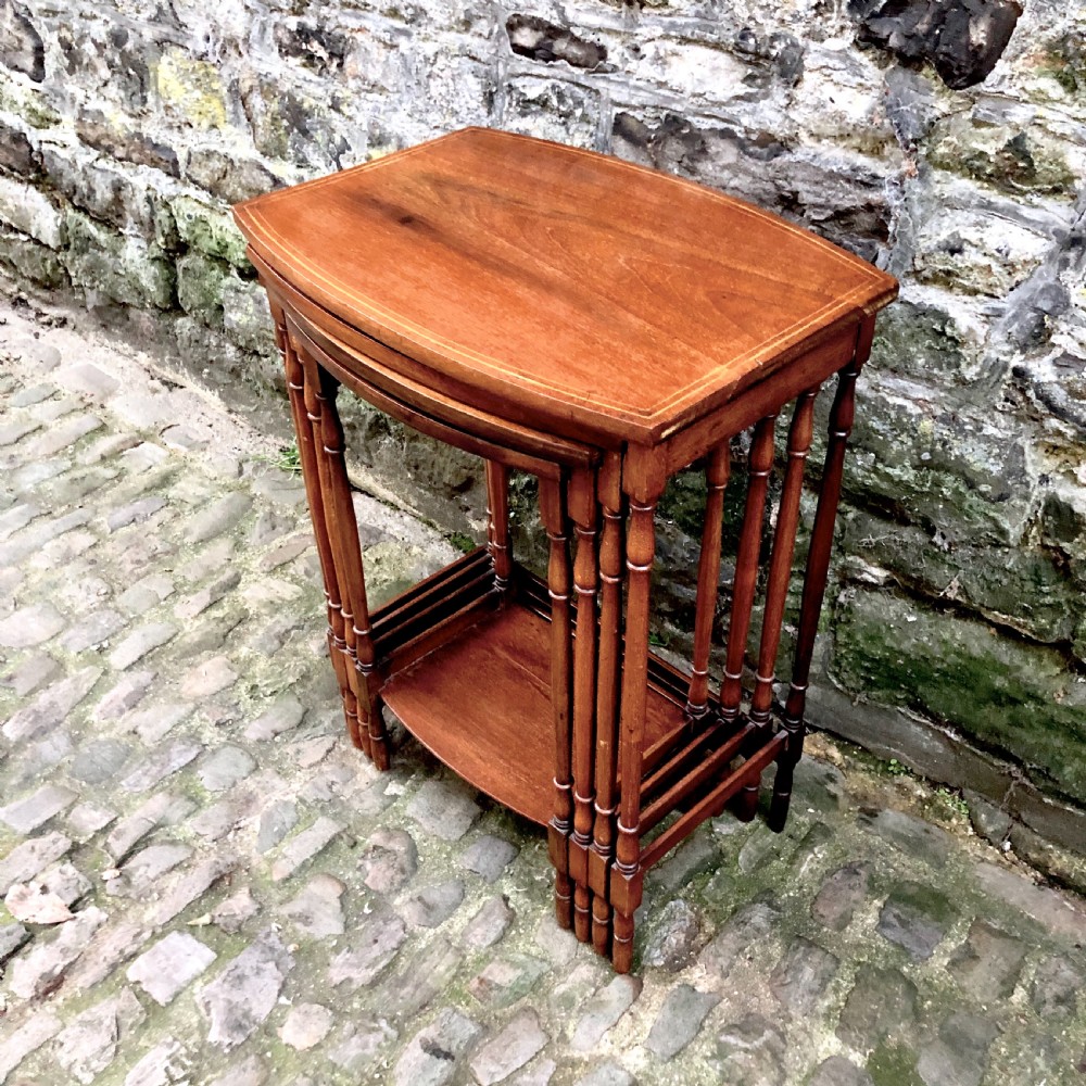 An Edwardian nest of four mahogany side tables  View IV