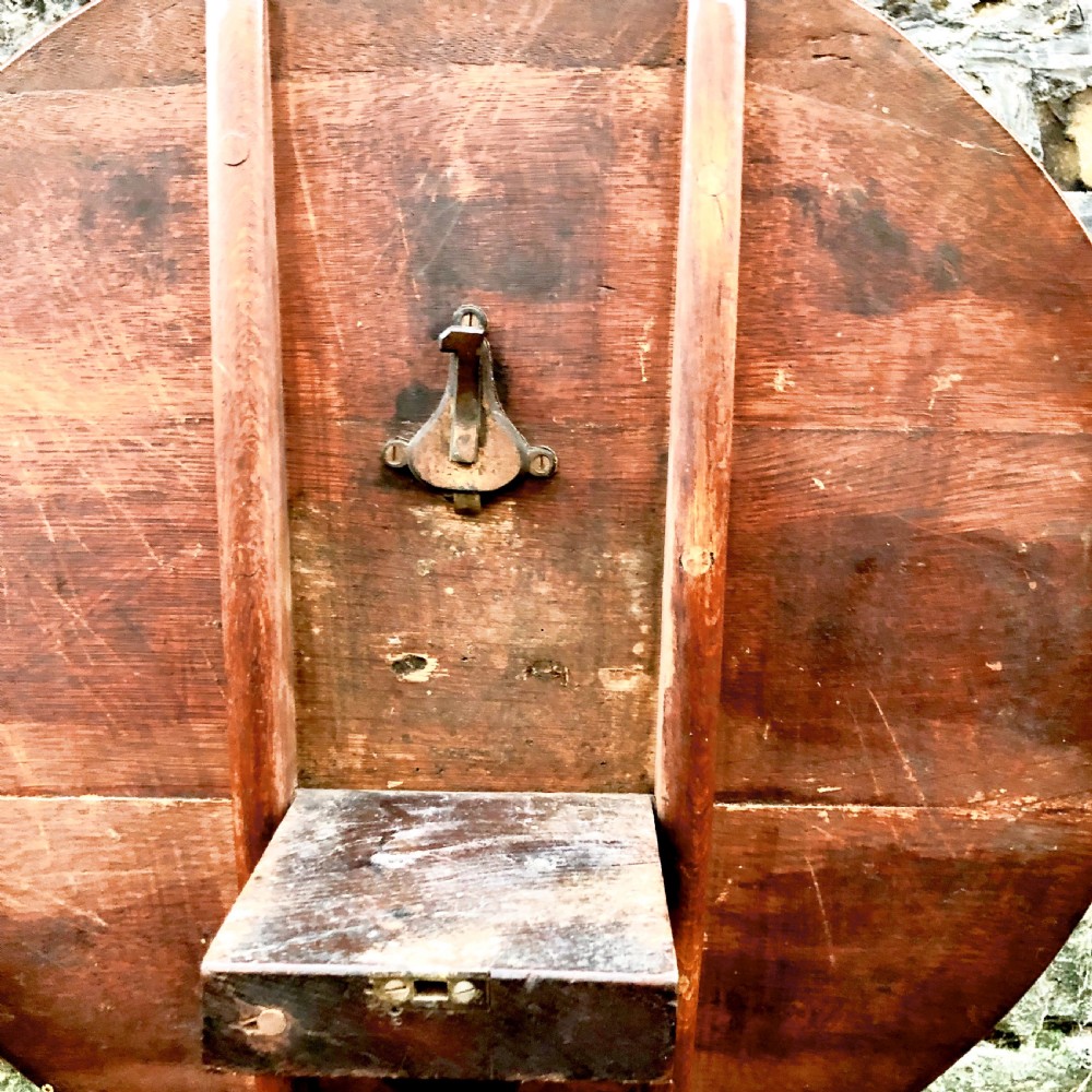 A George III oak tripod wine table  View VI