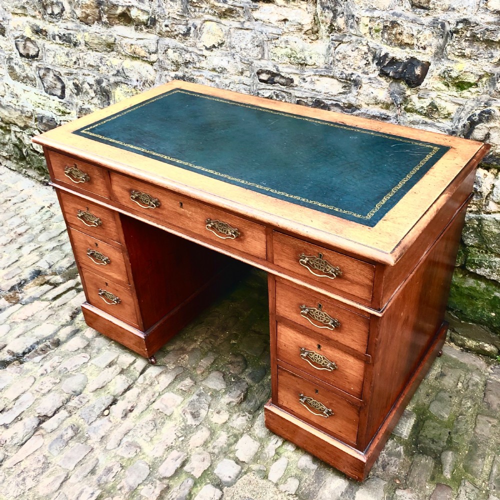 A small Edwardian walnut pedestal desk View II