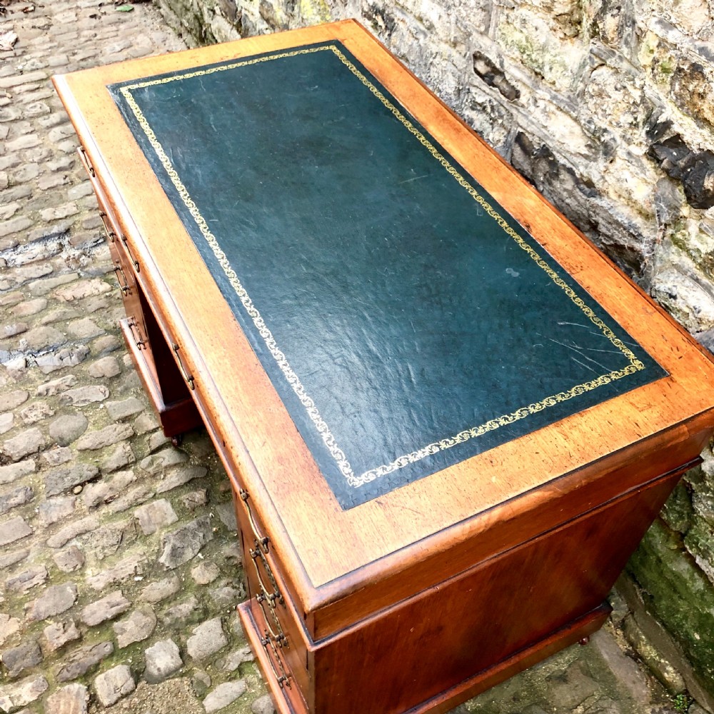 A small Edwardian walnut pedestal desk View IV