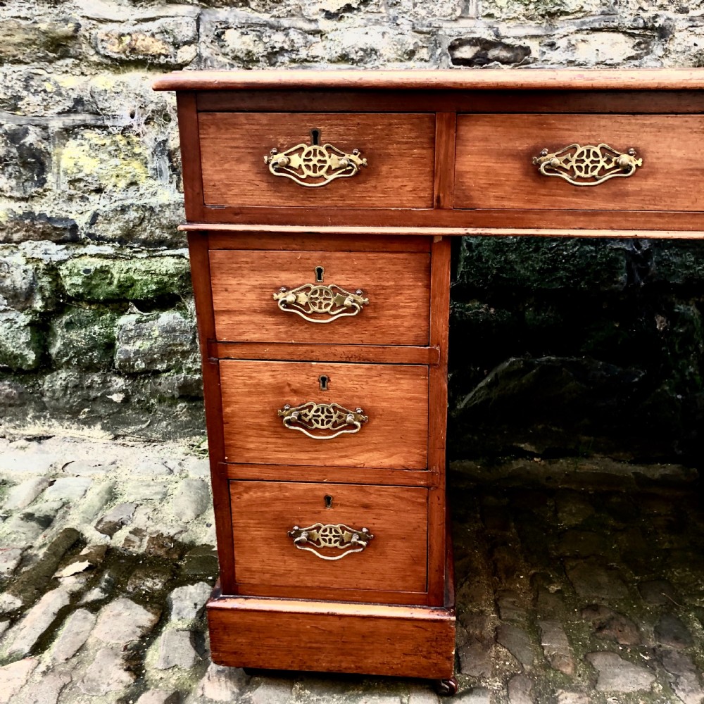 A small Edwardian walnut pedestal desk View VI