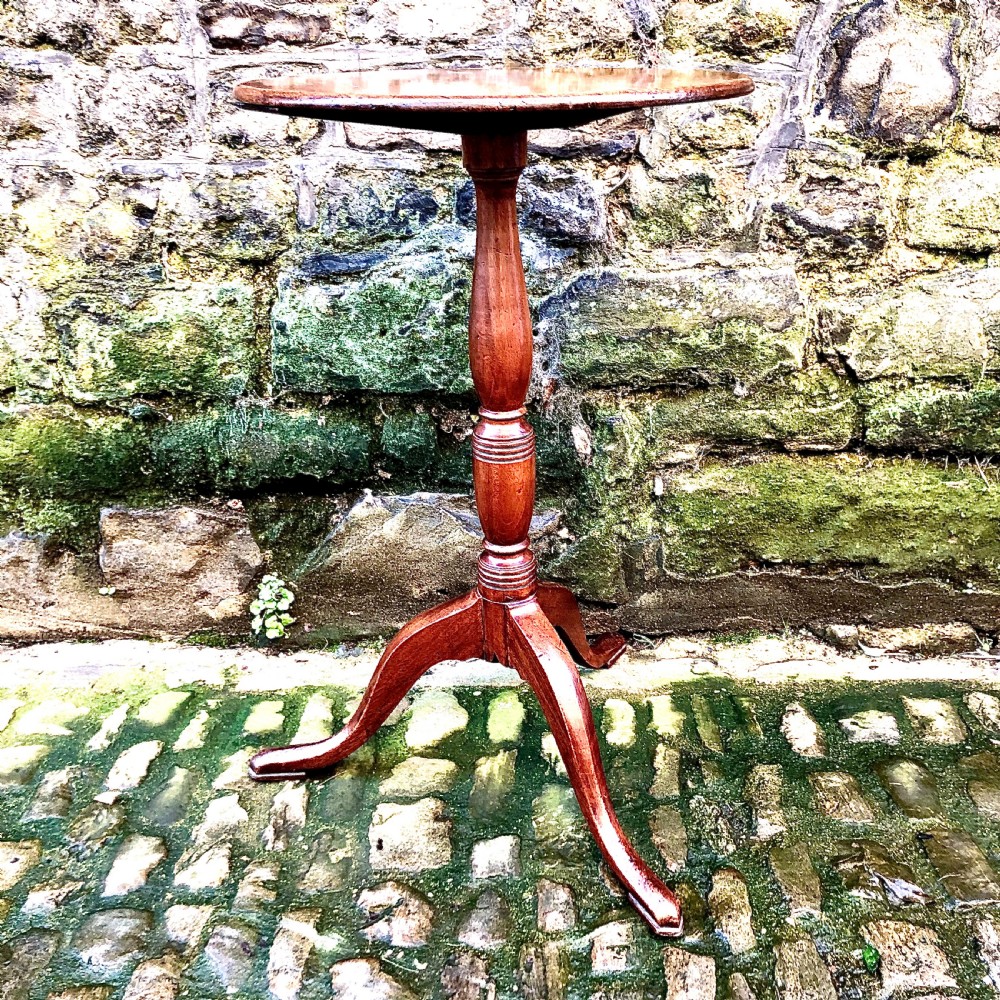 A Regency Mahogany tripod wine table  View II