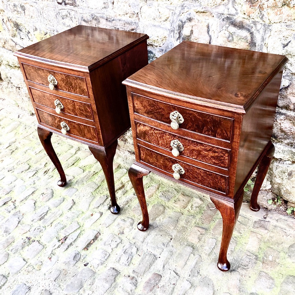 A pair of early 20th century walnut bedside tables  View II