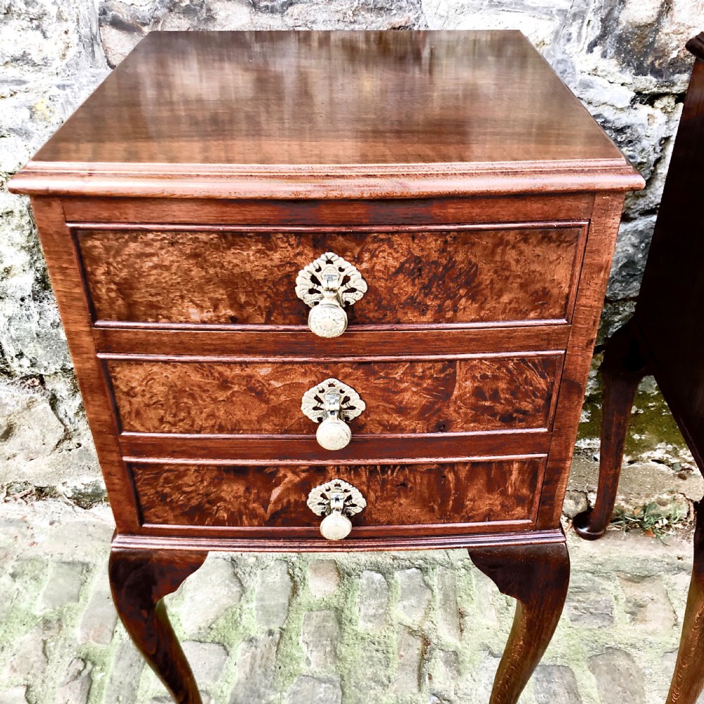 A pair of early 20th century walnut bedside tables  View VI