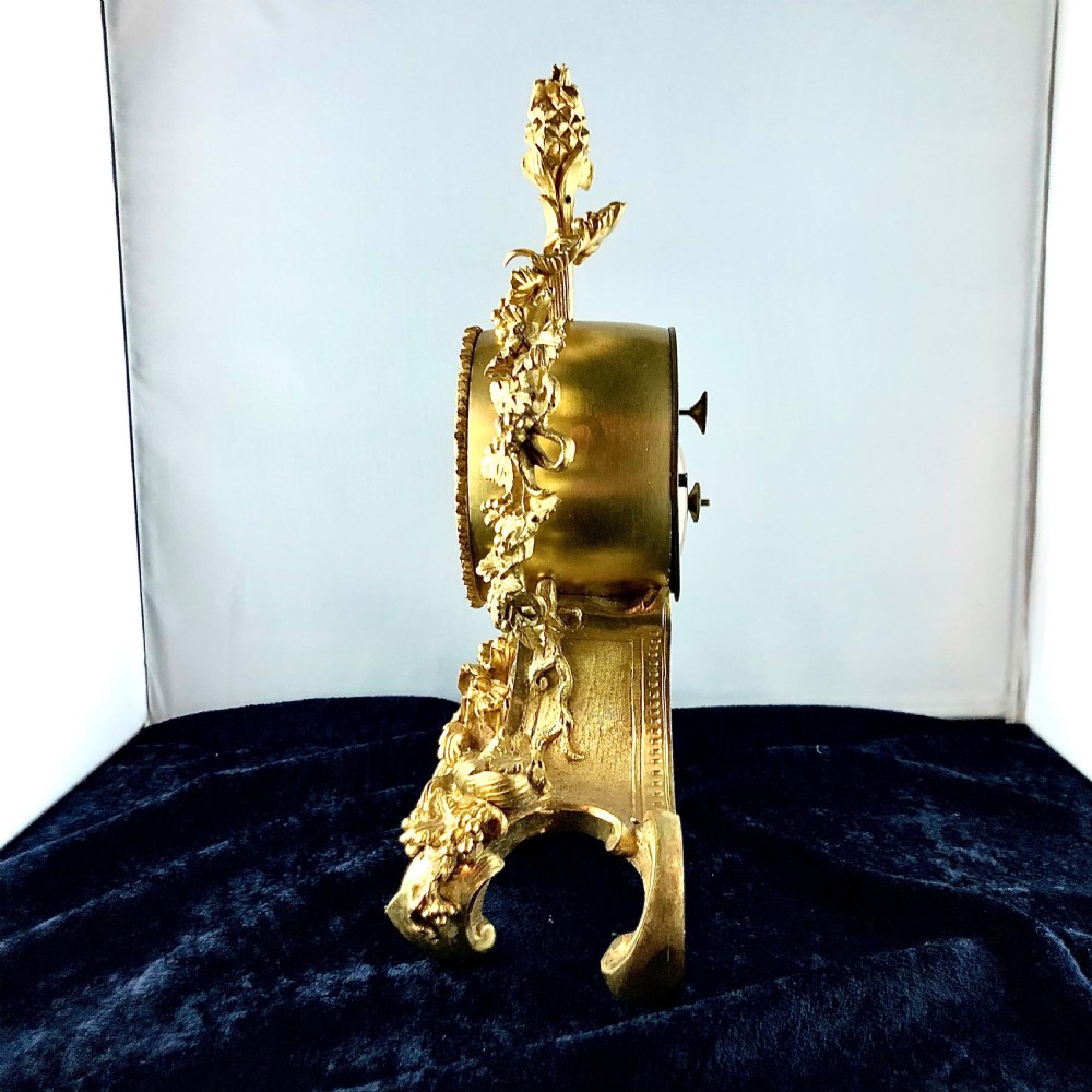 A Louis Philippe gilt bronze mantel clock by Raingo Frères  View IV