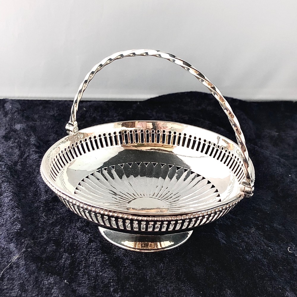 A George III silver sweetmeat basket circa 1780.