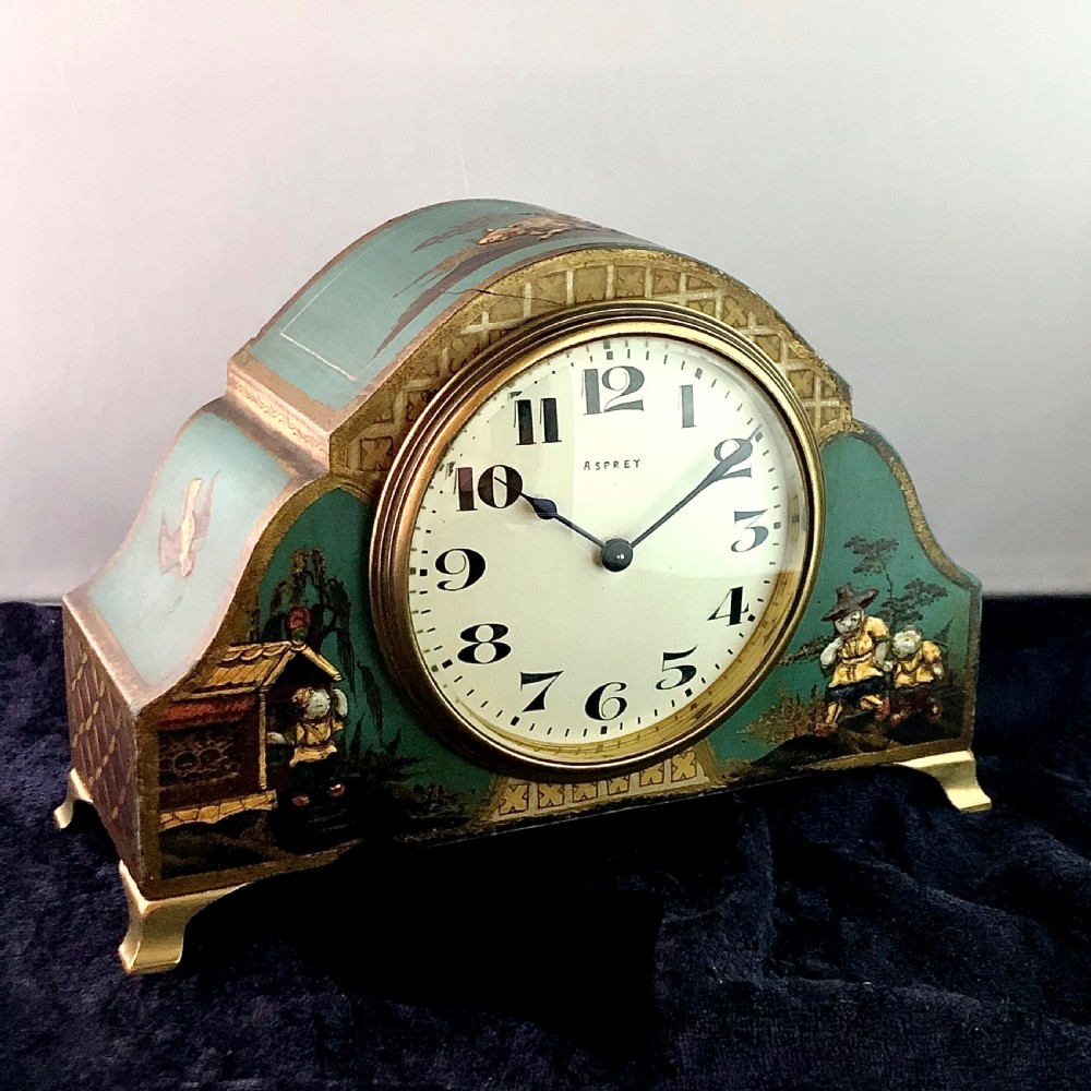 An early 20th century Chinoiserie mantel clock timepiece by Asprey.