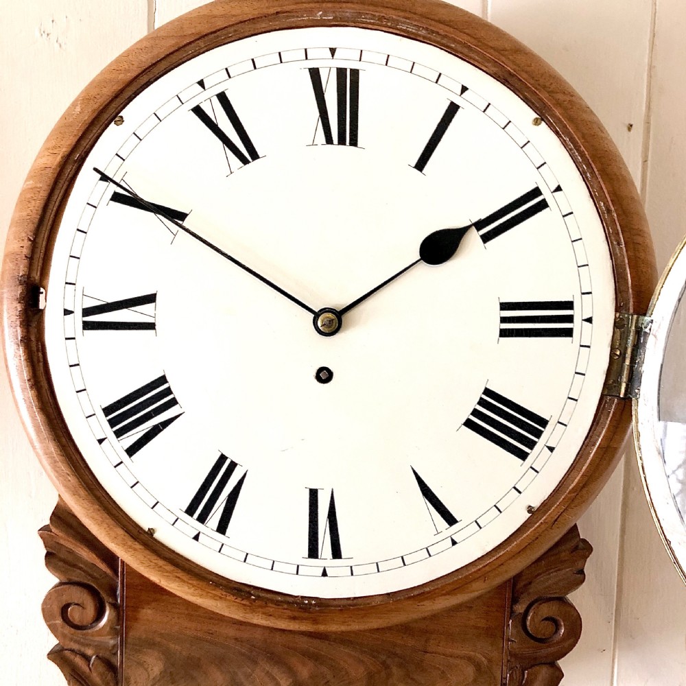 An early Victorian mahogany drop dial wall clock View III