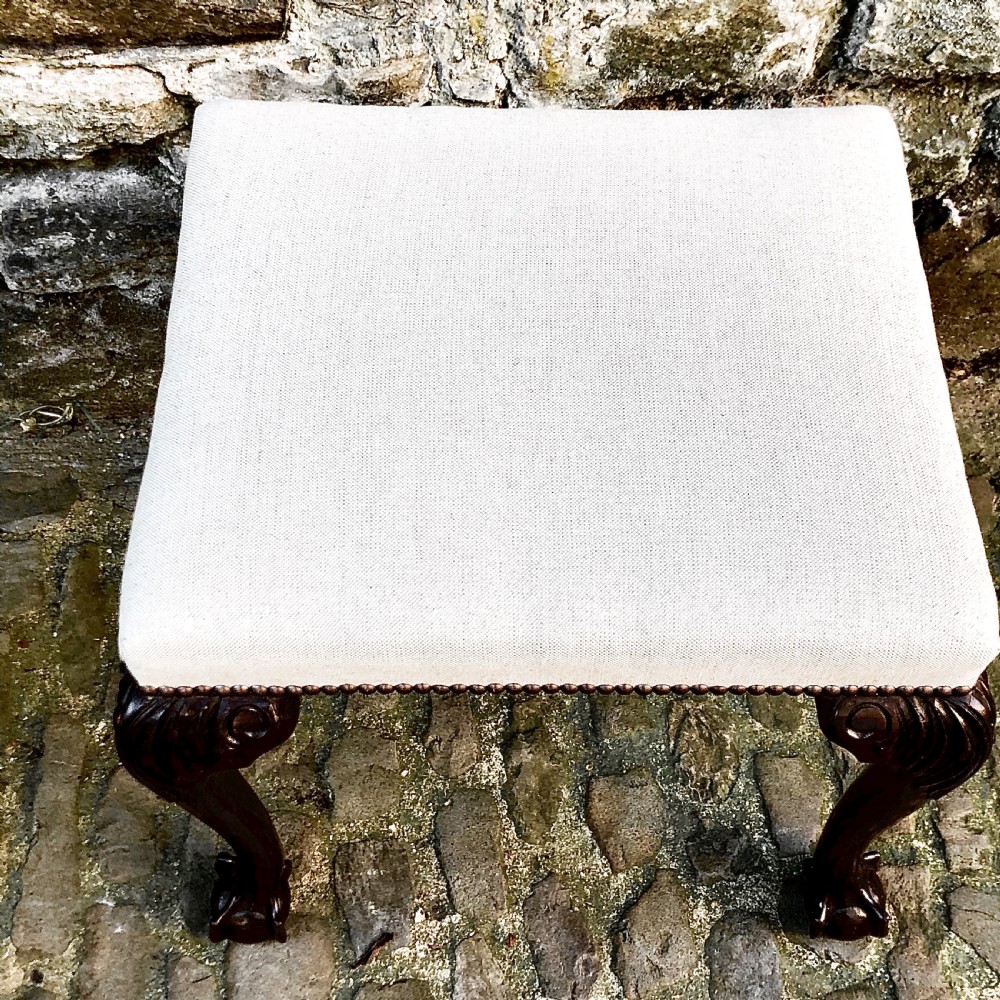 A late 19th century mahogany stool in the George II style View III