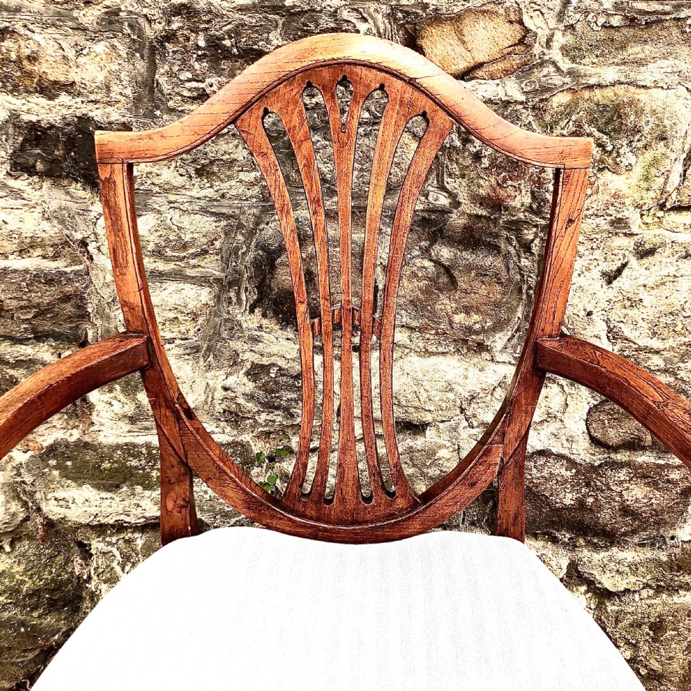 A George III elm shield back elbow chair View IV