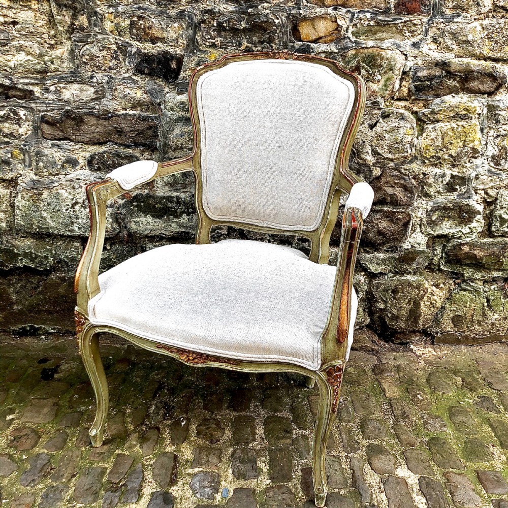 A Louis XV style painted armchair or fauteuil. 