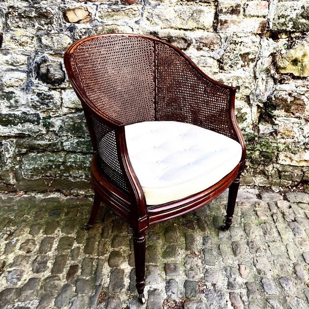 A George IV mahogany bergère chair View V