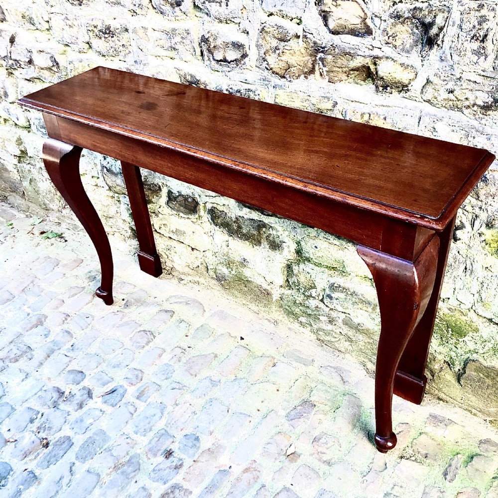 A pair of late 19th century mahogany console tables  View III
