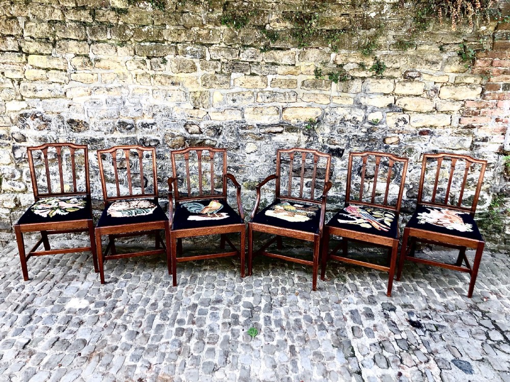 A set of six Sheraton revival mahogany dining chairs 