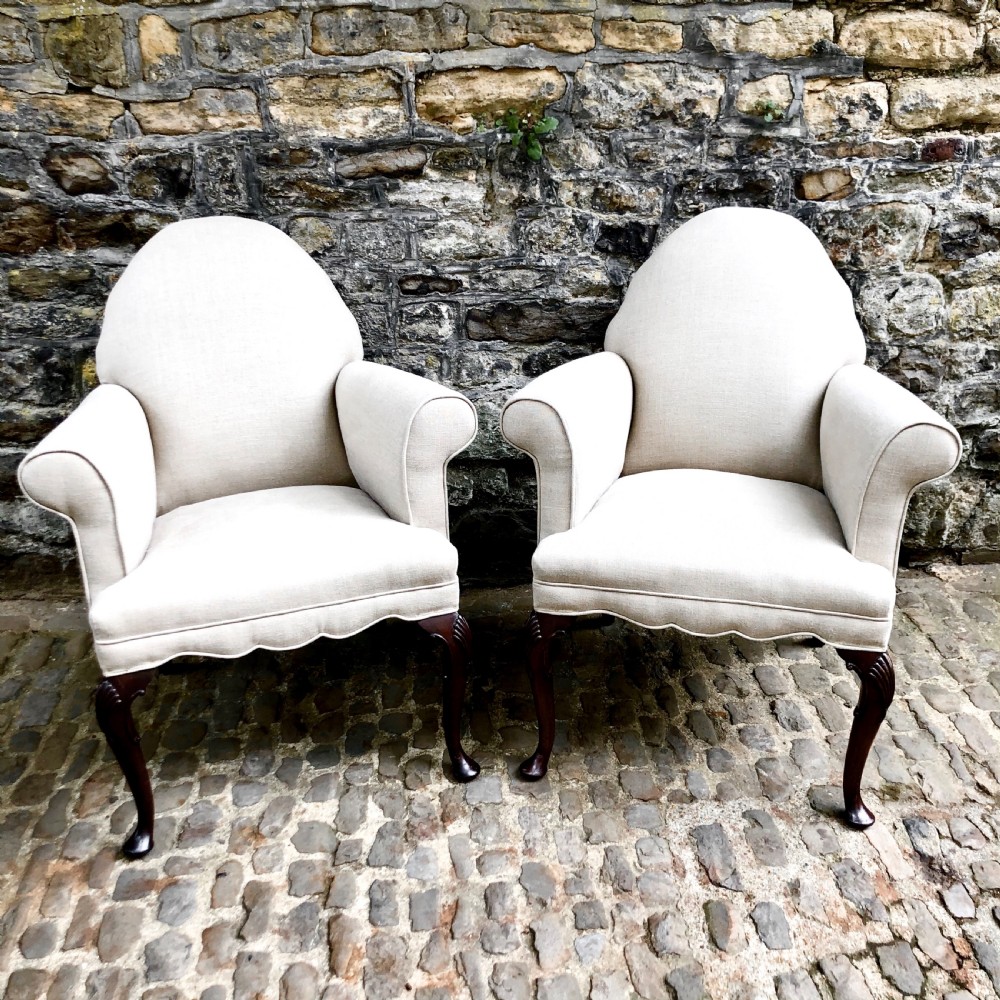 A pair of late 19th century walnut armchairs 