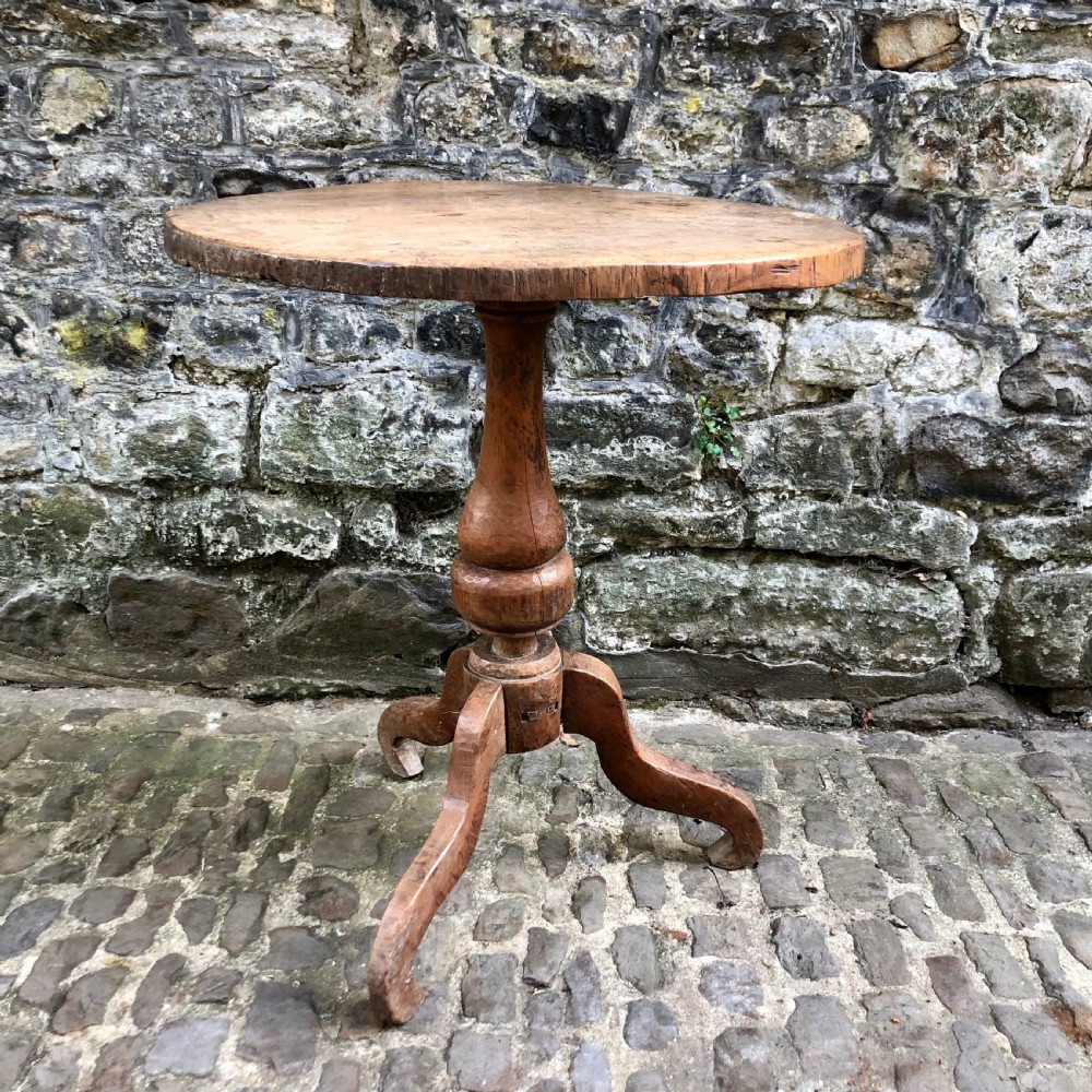 An unusual artisan made elm tripod table 