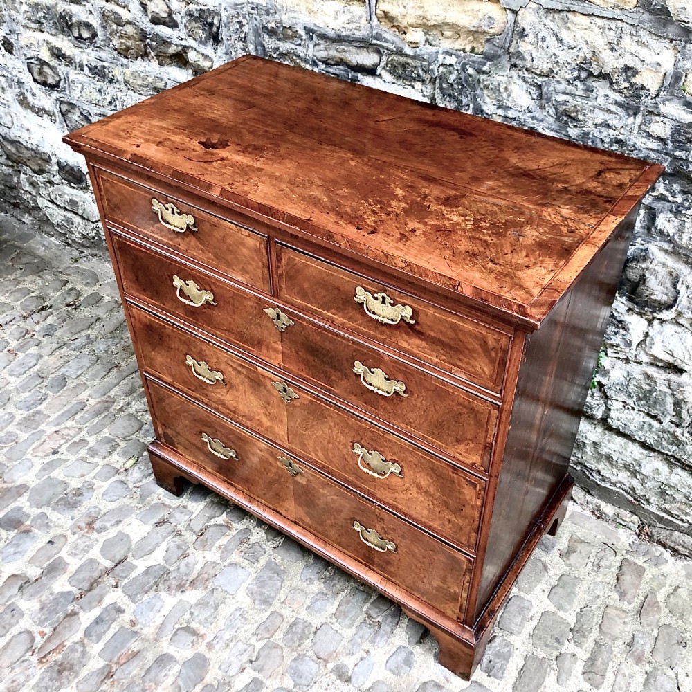 A George II walnut chest of drawers  View IV
