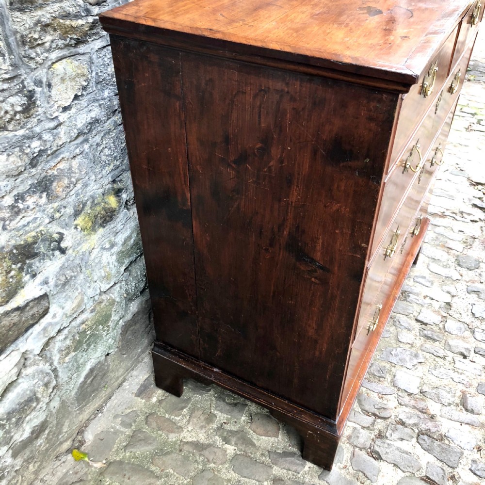 A George II walnut chest of drawers  View VI