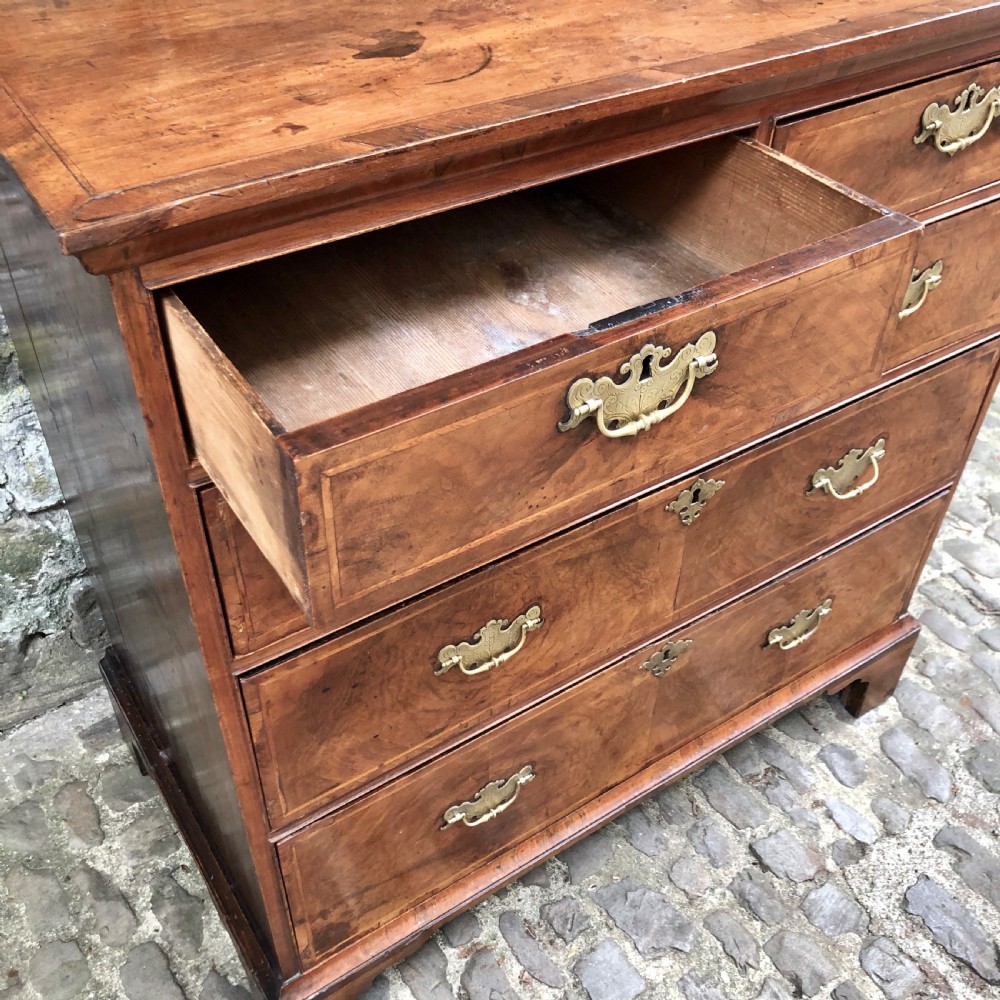 A George II walnut chest of drawers  View VIII