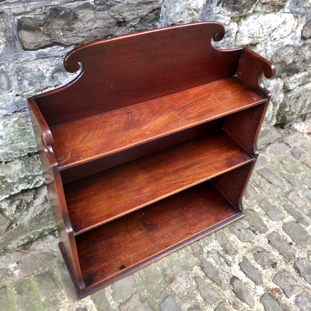 A George III mahogany tabletop waterfall bookcase.  View II