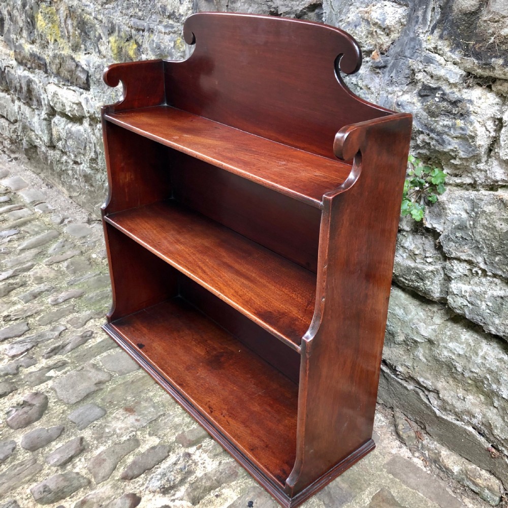 A George III mahogany tabletop waterfall bookcase.  View IV