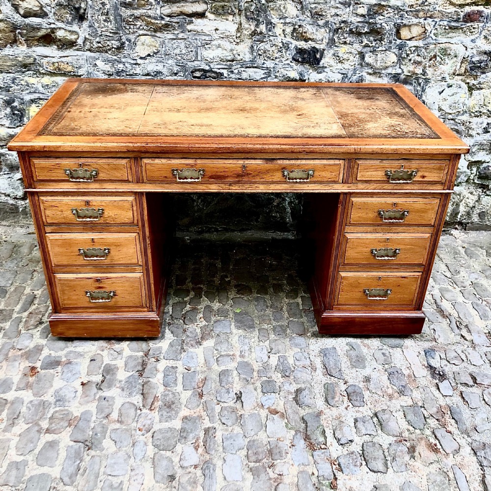 A late 19th century mahogany pedestal desk