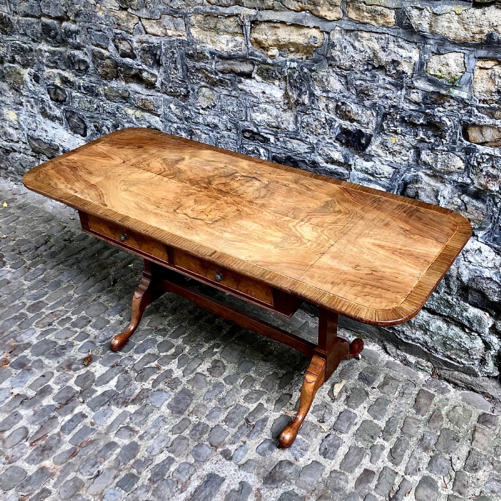 An early 20th century walnut sofa table by Heals View V
