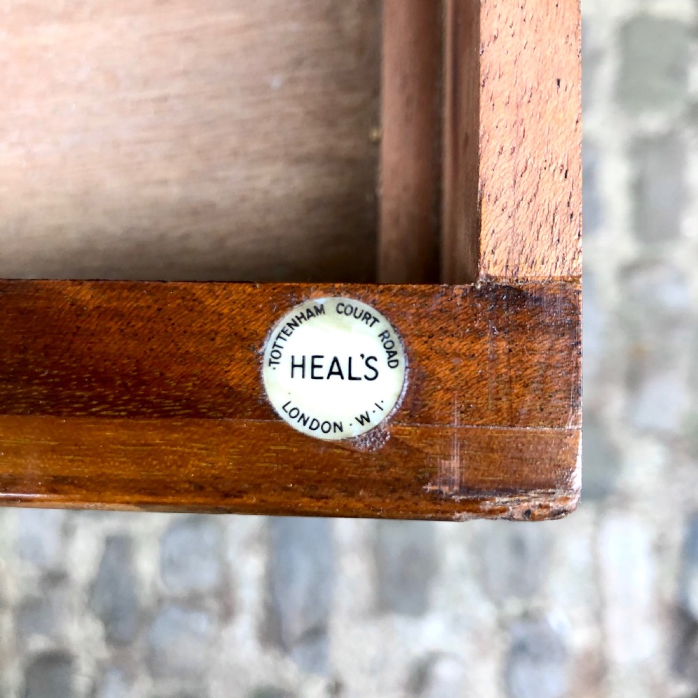 An early 20th century walnut sofa table by Heals View VII