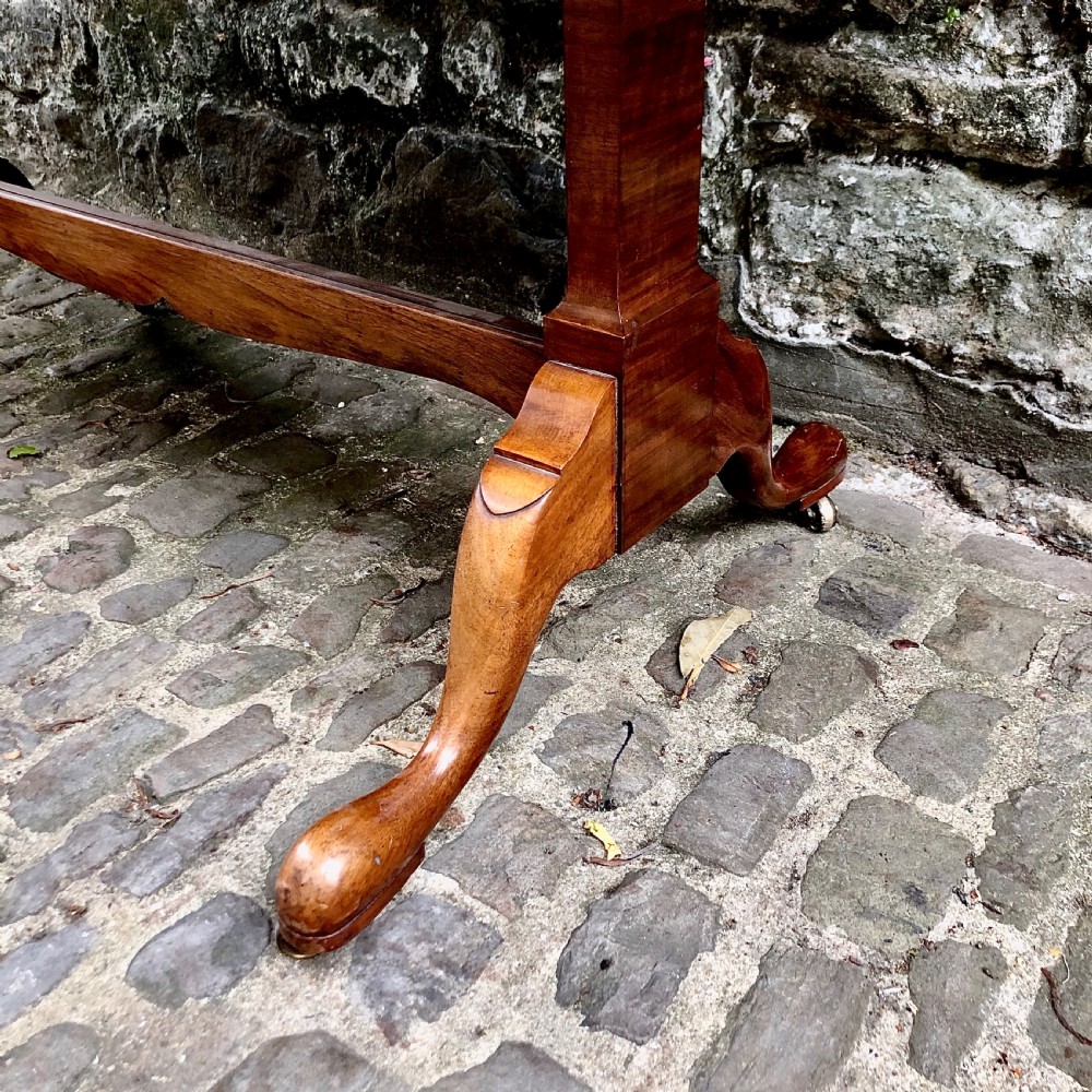 An early 20th century walnut sofa table by Heals View VIII