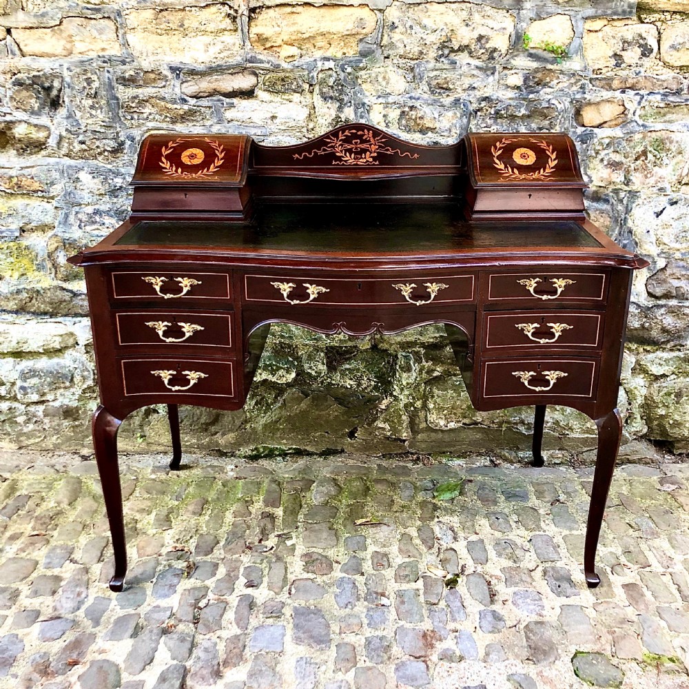 A fine late 19th century mahogany writing table desk