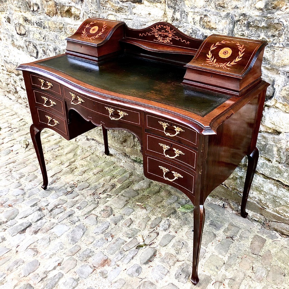 A fine late 19th century mahogany writing table desk View II